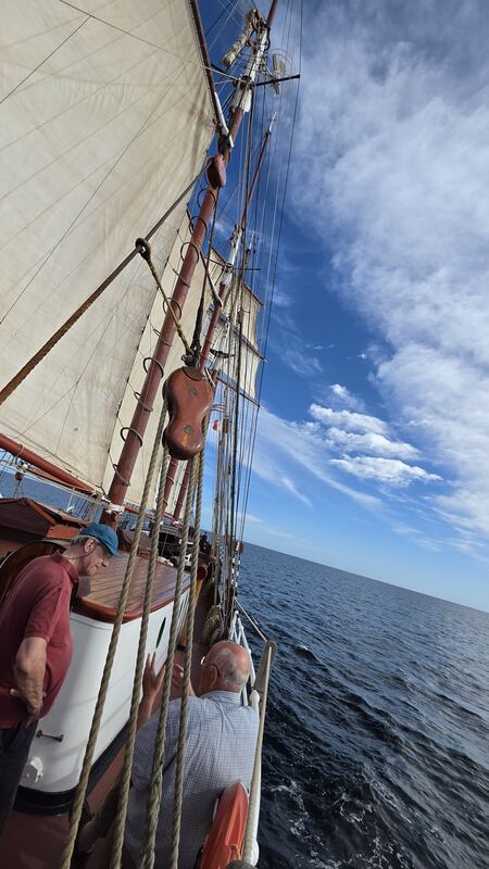 Heeled over, mainsail full