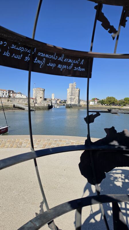 The harbour entrance through the sculpture on the quay, La Rochelle